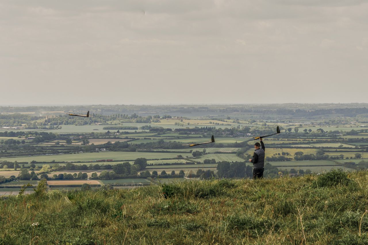 A 3 photo composite showing a model aircraft enthusiast launching their glider.